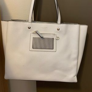 Henri Bendel Influencer Tote, white with silver zipper area.
